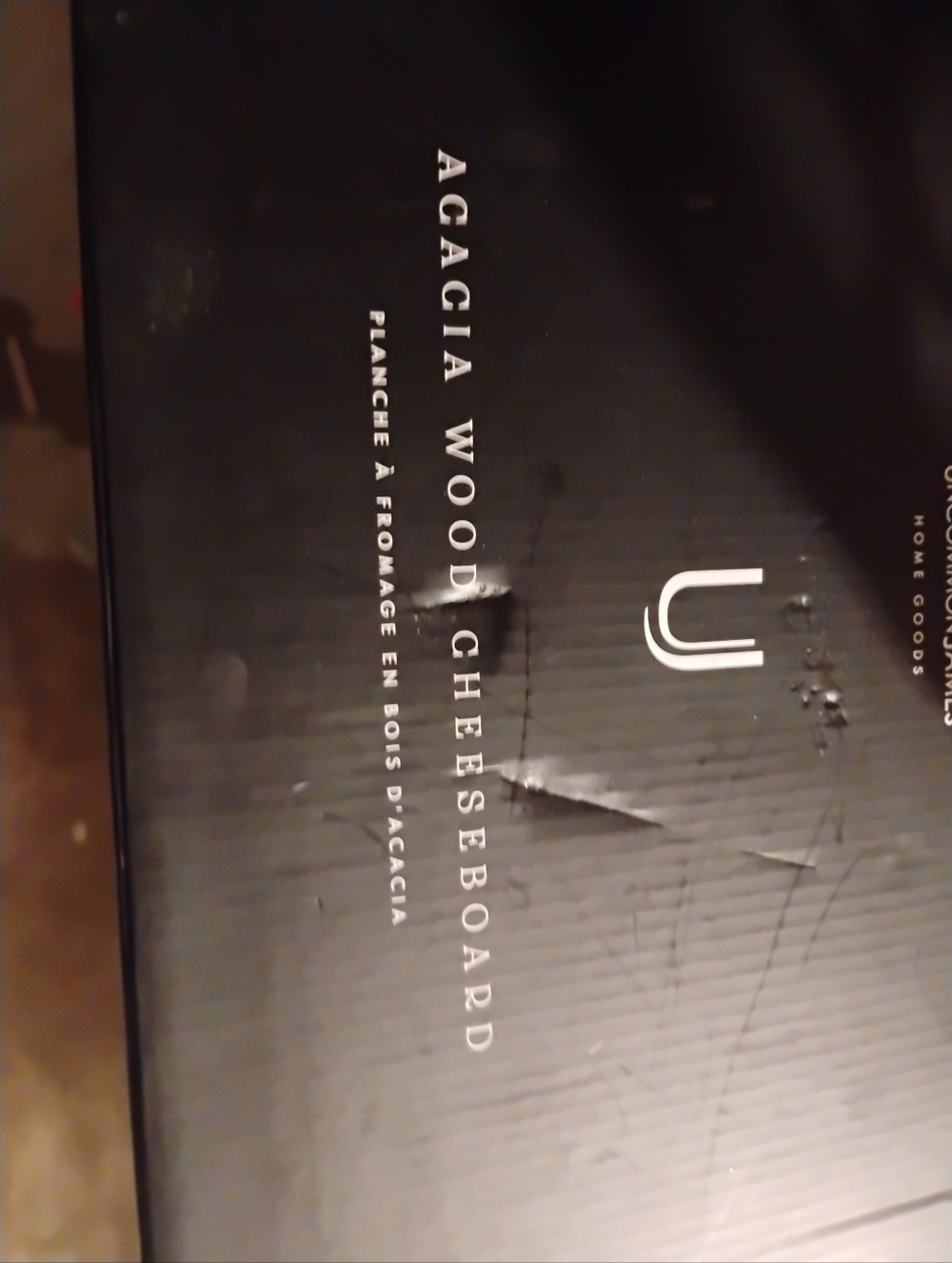 Uncommon James Black Packaging with White Text